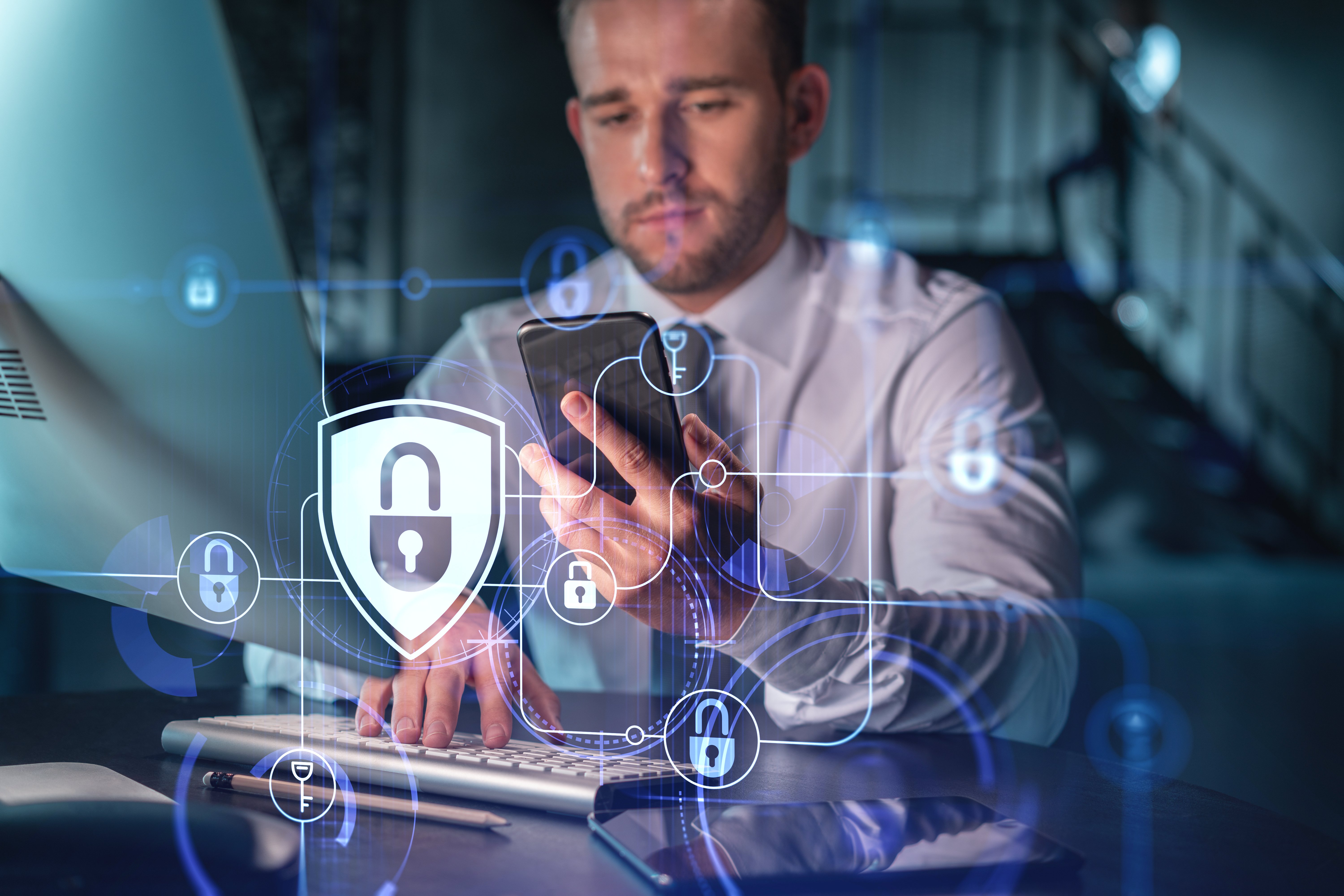 businessman-casual-wear-checking-cyber-security-using-smart-phone-protect-clients-confidential-information-it-hologram-lock-icons-modern-office-background-night-time