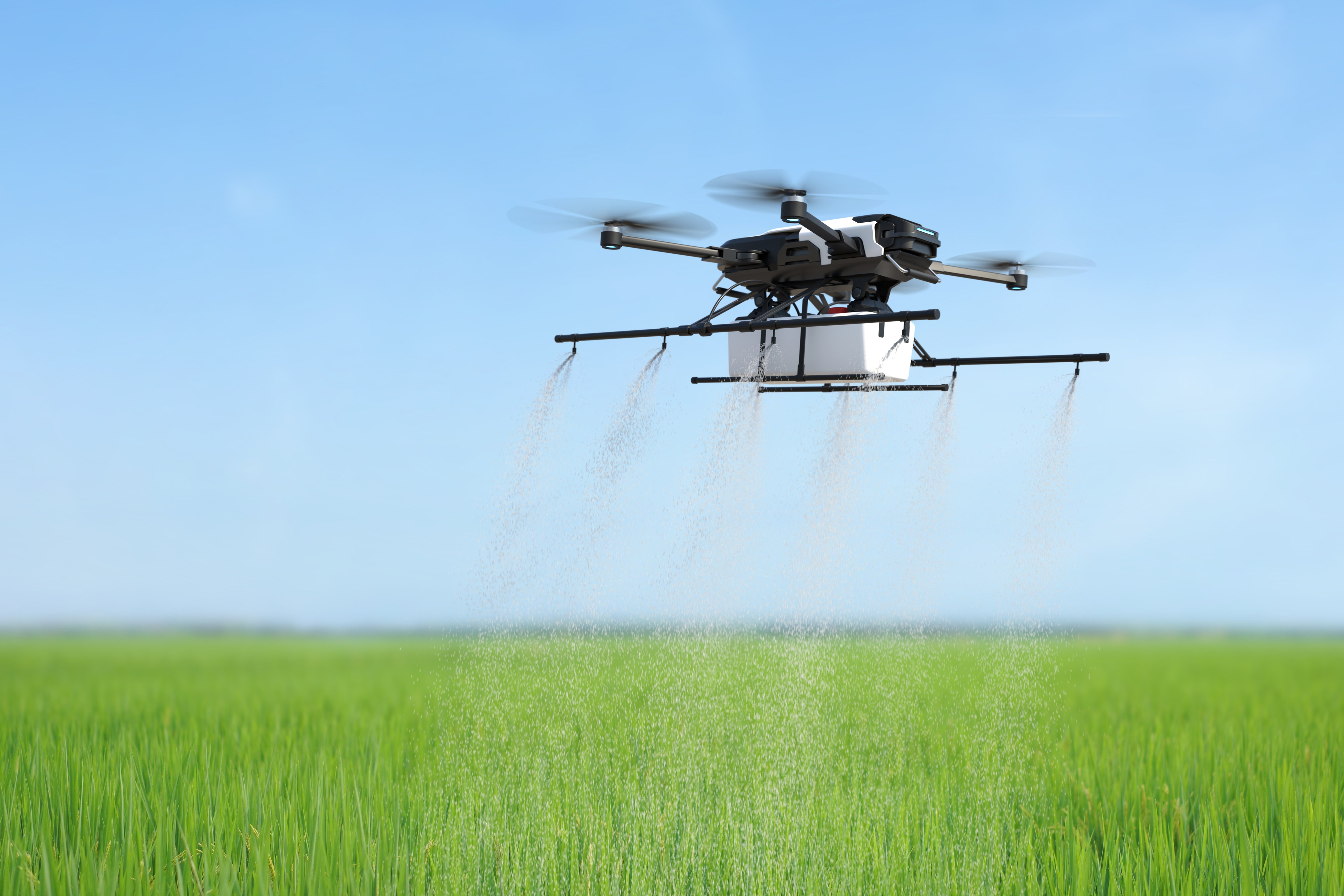 drone-spraying-fertilizer-vegetable-green-plants-agriculture-technology-farm-automation