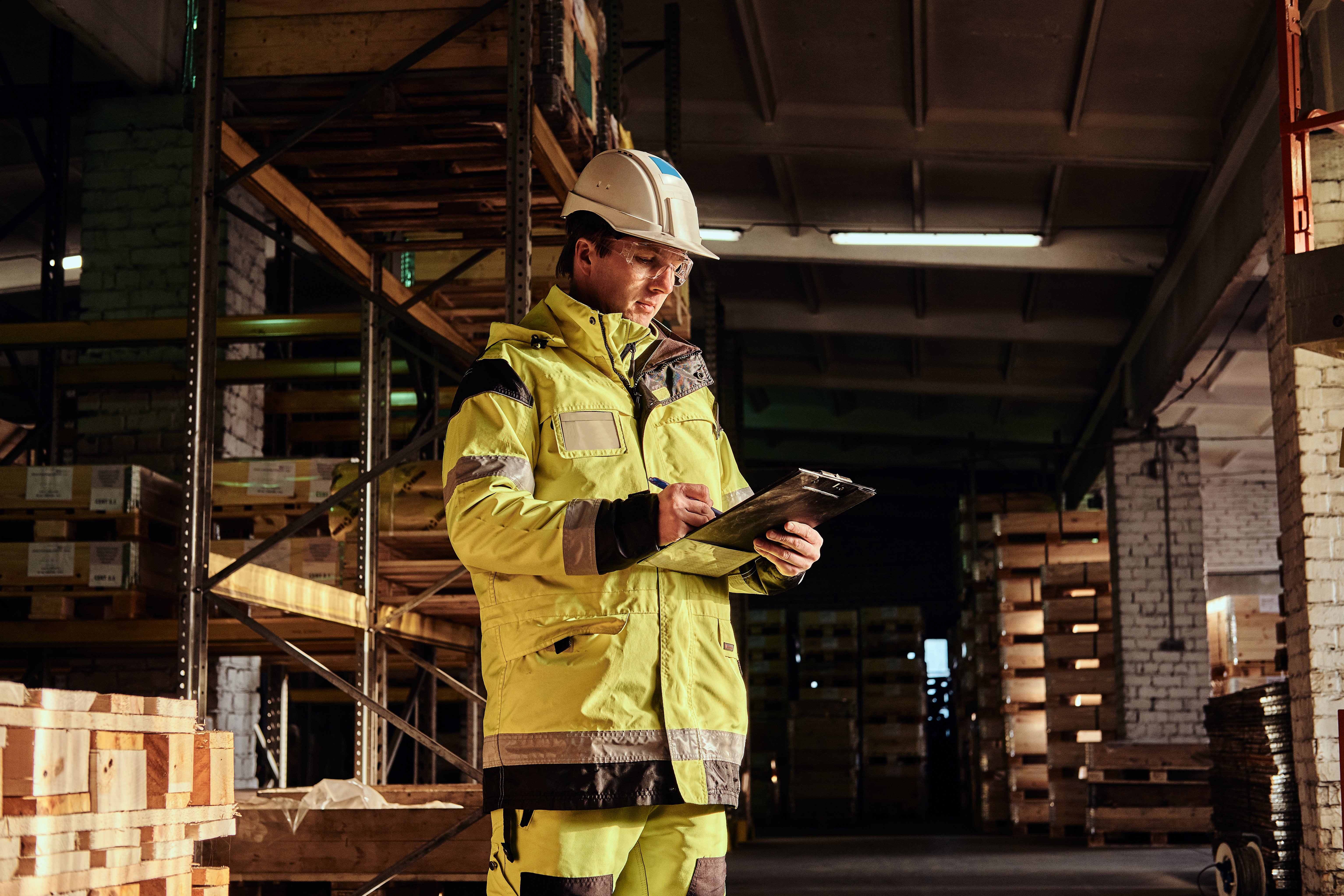 experienced-manager-is-checkin-necessary-paperworks-warehouse